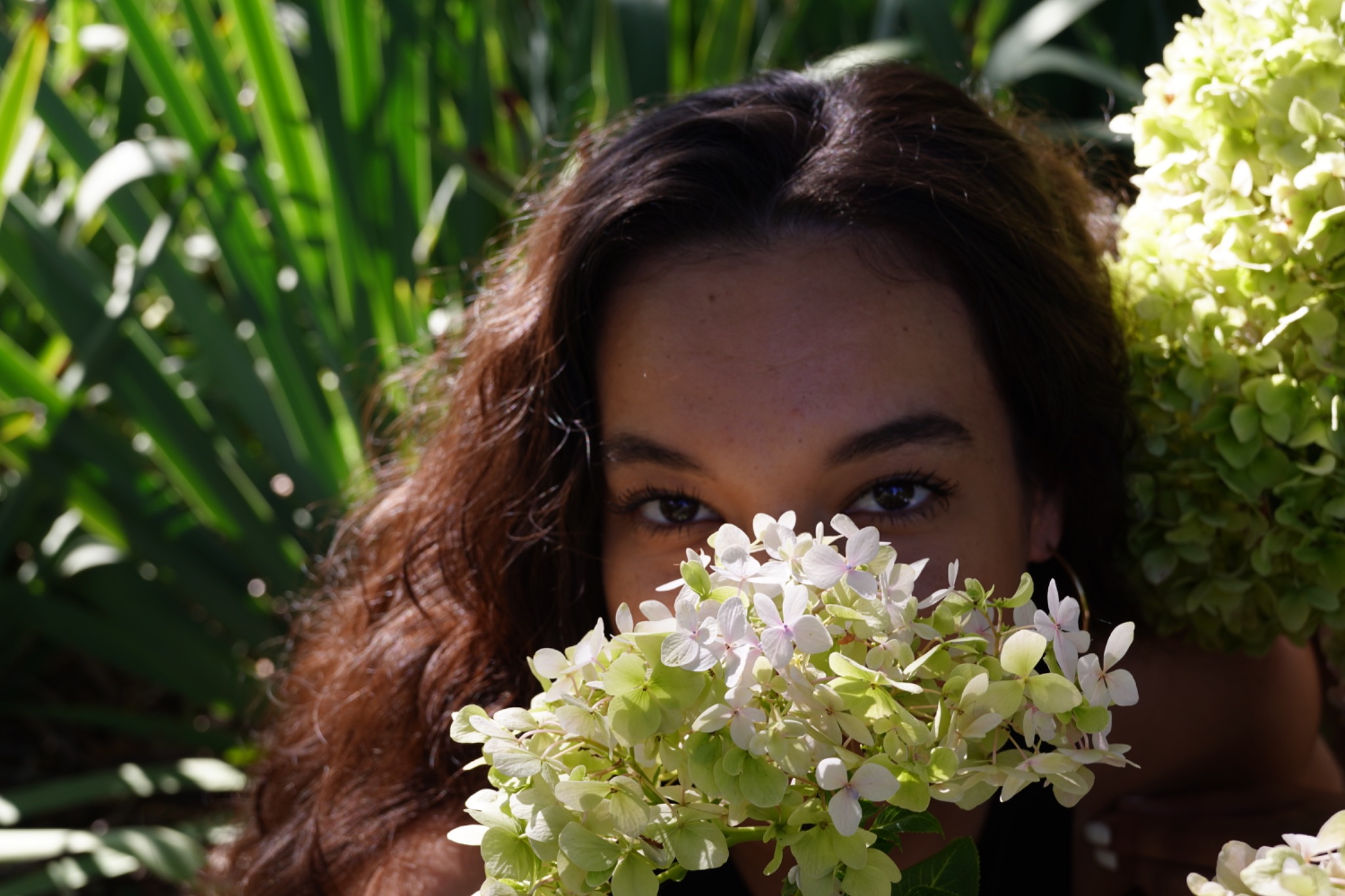 Project Five portrait framed by flowers
